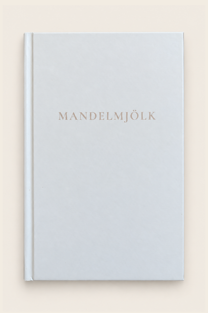 Vit Mandelmjölk anteckningsbok mot beige bakgrund